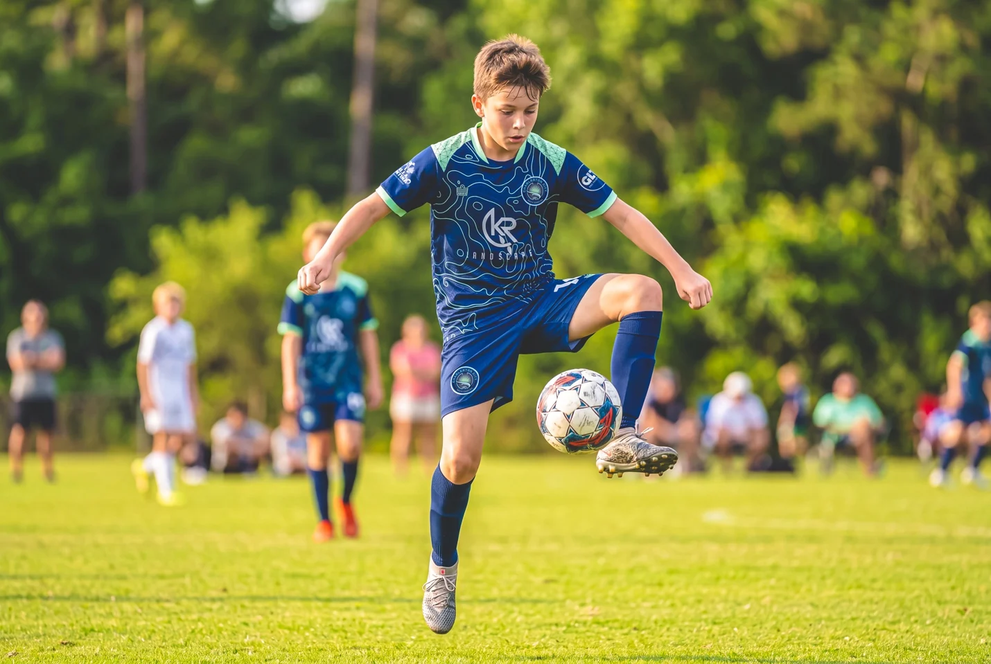 Charleston City FC player wearing the navy away kit