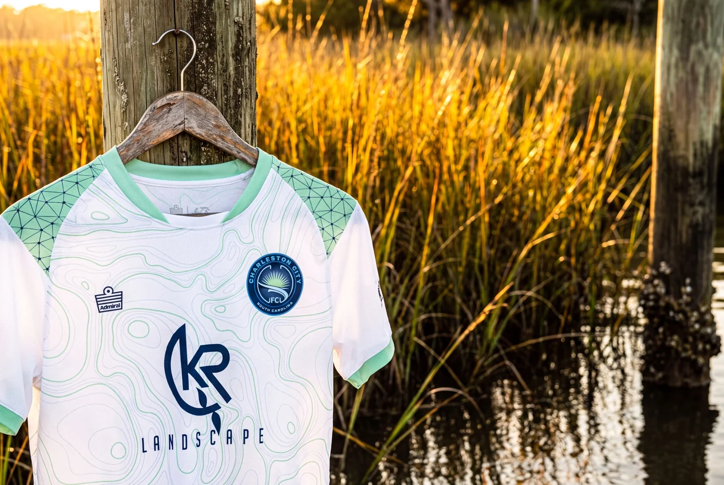 Charleston City FC white and teal jersey in the Lowcountry landscape